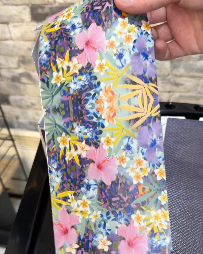 Embossed foil sheet held at the chair